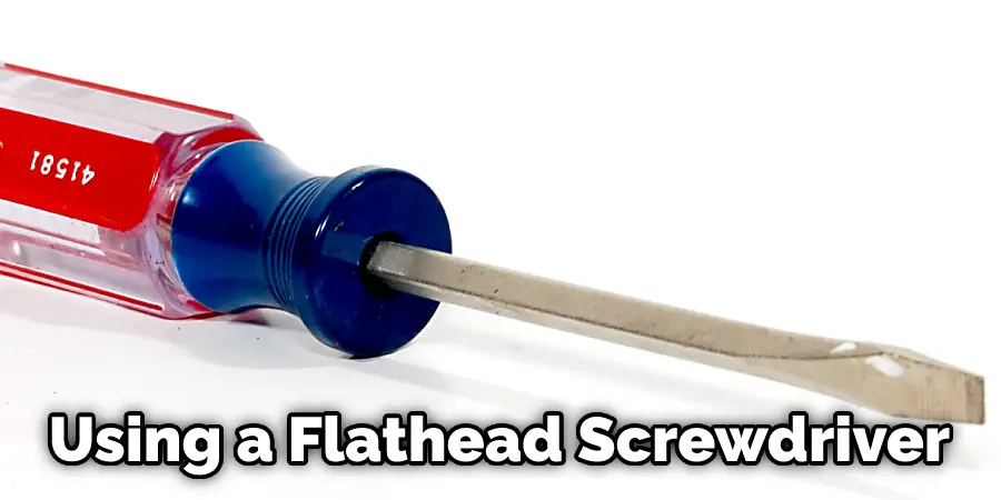 Using a Flathead Screwdriver