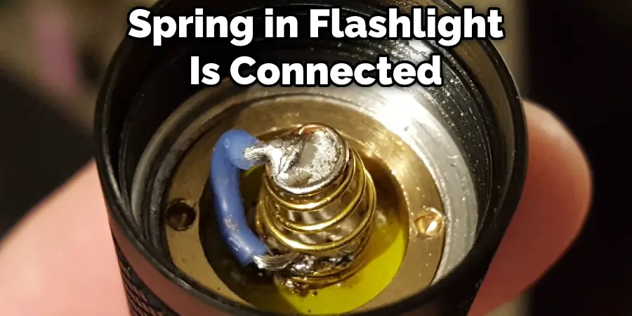 Spring in Flashlight Is Connected