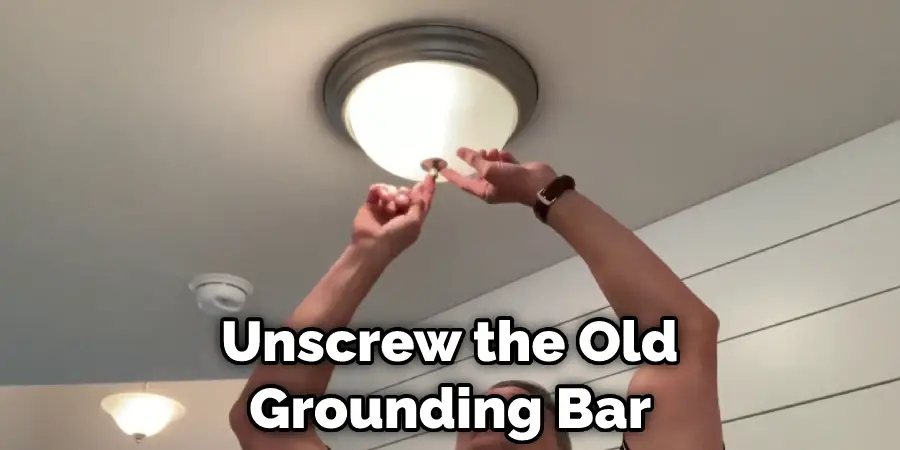 Unscrew the Old Grounding Bar 