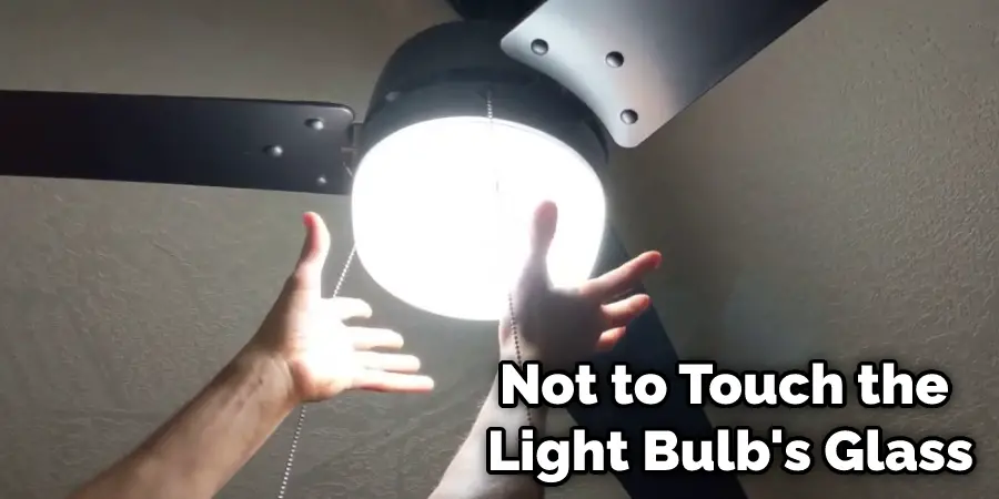 how to remove a stuck light bulb from a ceiling fan