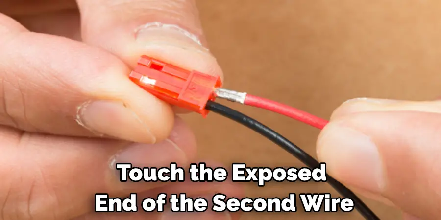 Touch the Exposed End of the Second Wire