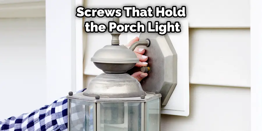 Screws That Hold  the Porch Light