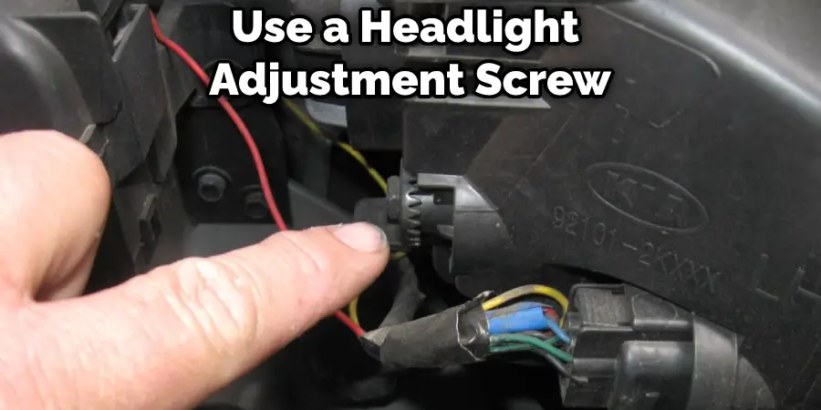Use a Headlight  Adjustment Screw