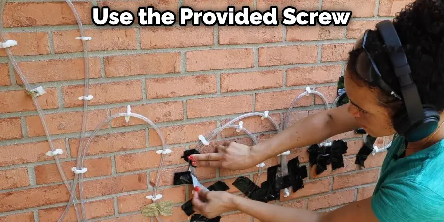 Use the Provided Screw