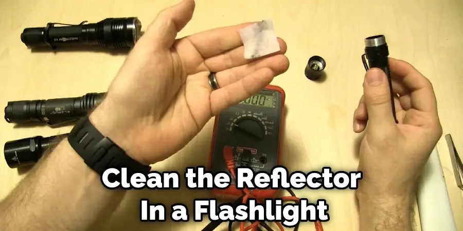 Clean the Reflector  In a Flashlight