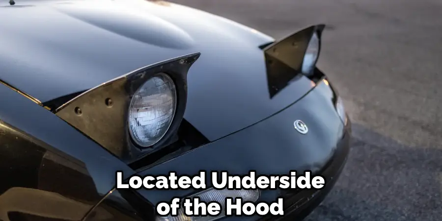 Located Underside of the Hood