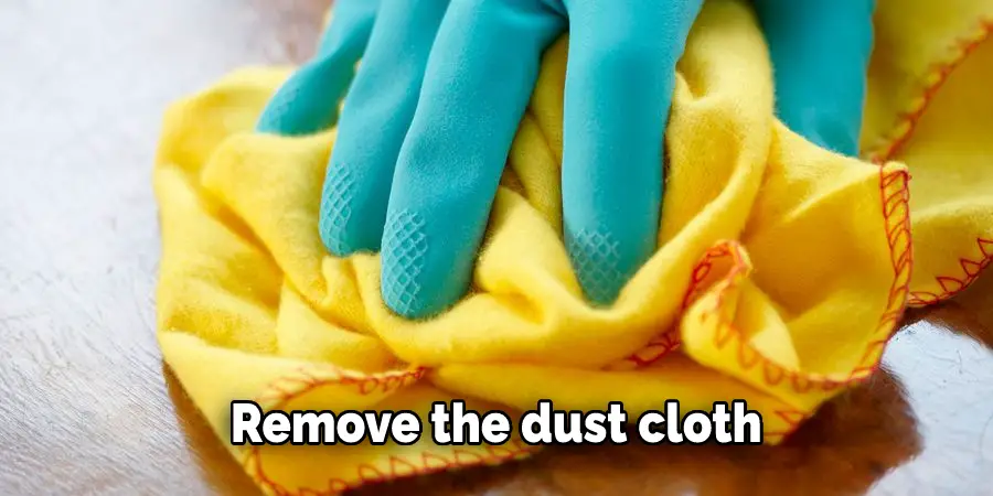 Remove the dust cloth or painter's