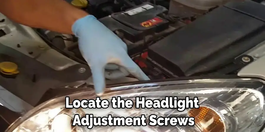 Locate the Headlight  Adjustment Screws