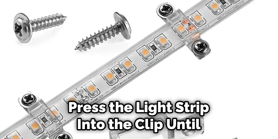 Press the Light Strip Into the Clip Until 