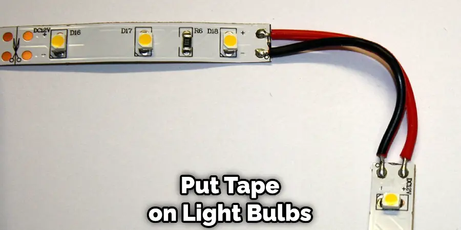 Put Tape on Light Bulbs