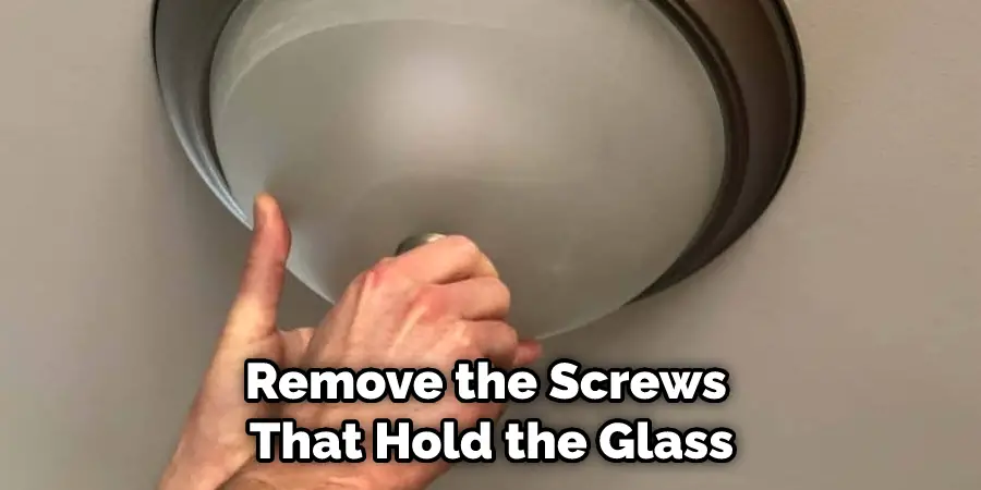 Remove the Screws That Hold the Glass