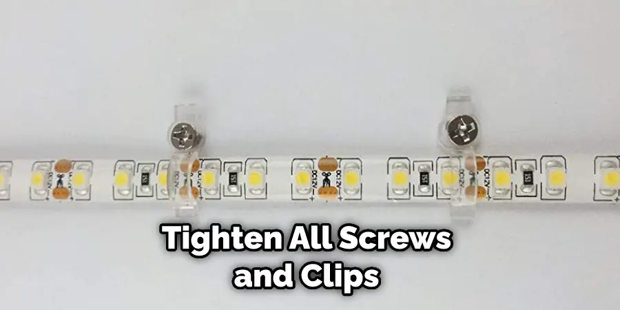 Tighten All Screws and Clips 