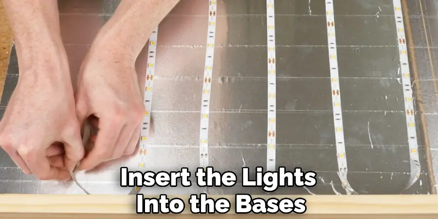 Insert the Lights Into the Bases