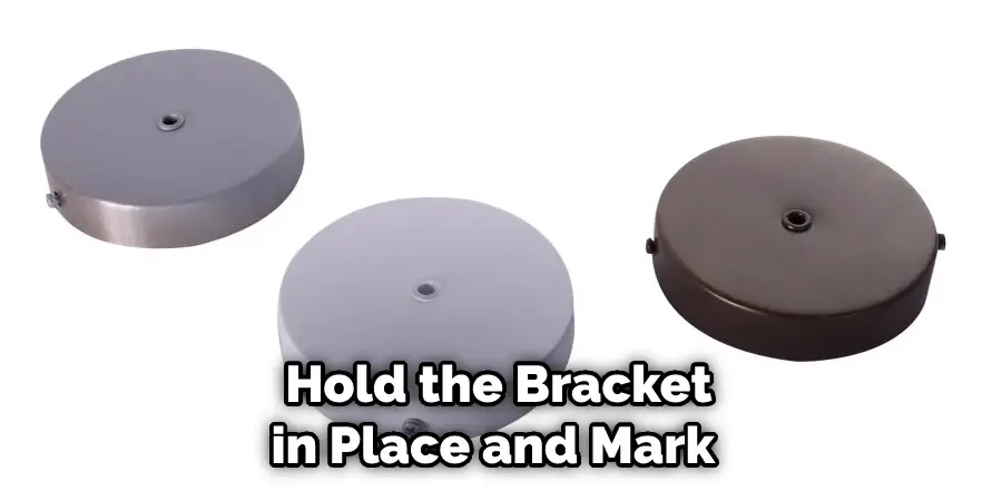  Hold the Bracket in Place and Mark 