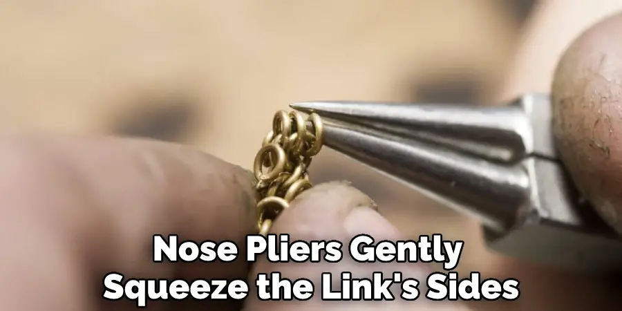 Nose Pliers Gently Squeeze the Link's Sides