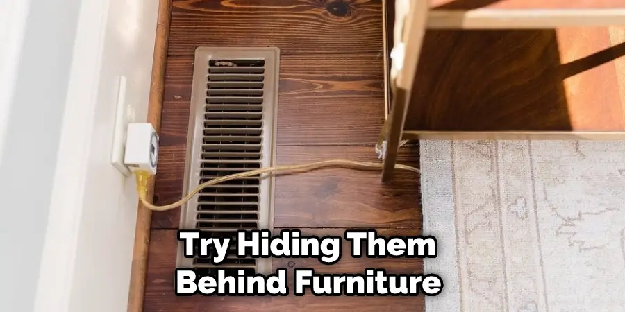  Try Hiding Them Behind Furniture