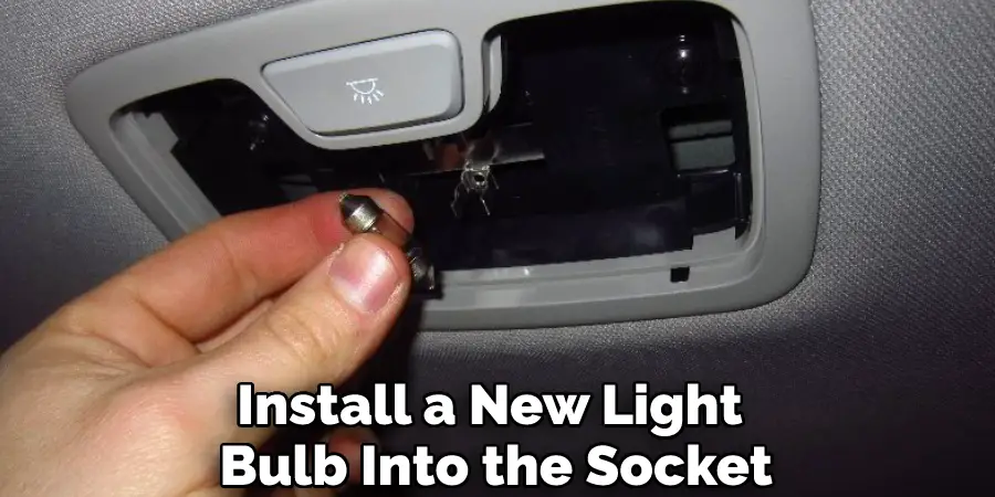 Install a New Light Bulb Into the Socket