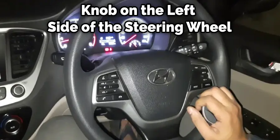 Knob on the Left Side of the Steering Wheel
