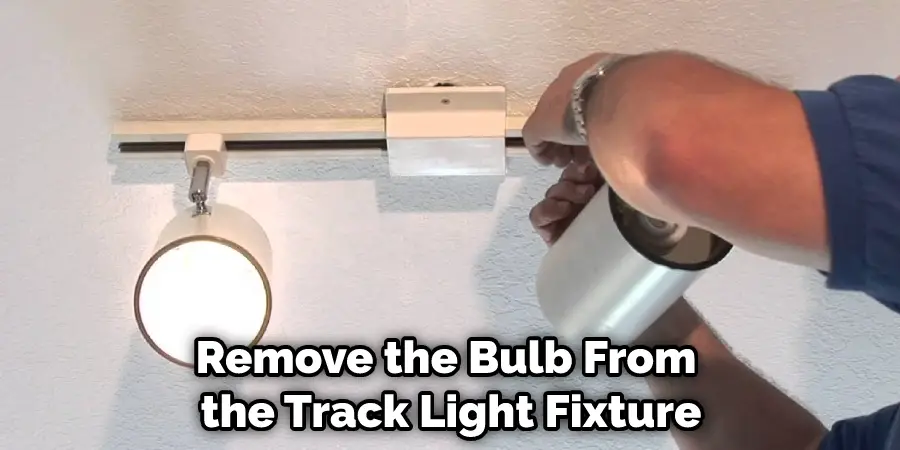 Remove the Bulb From the Track Light Fixture