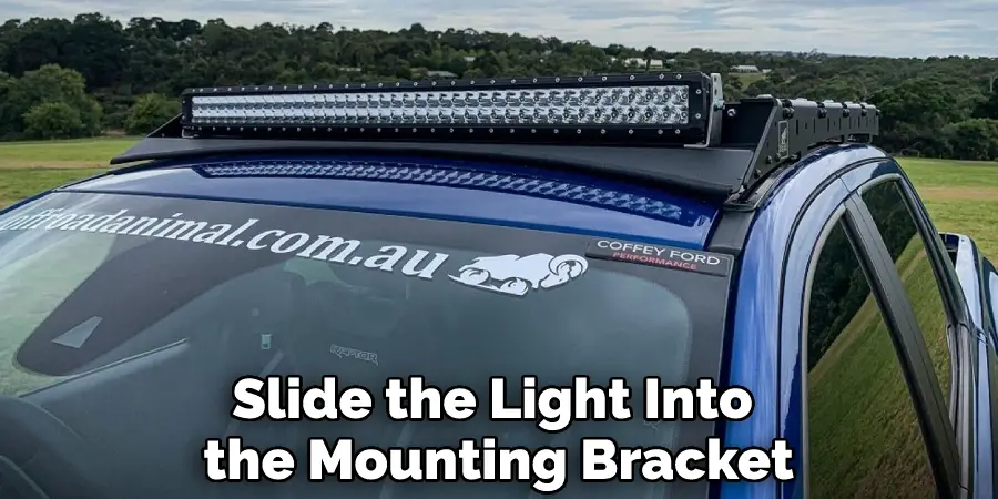 Slide the Light Into the Mounting Bracket