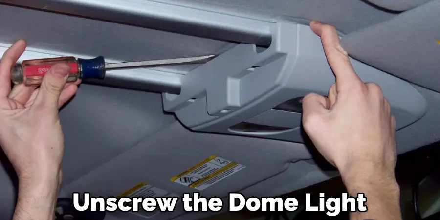 Unscrew the Dome Light