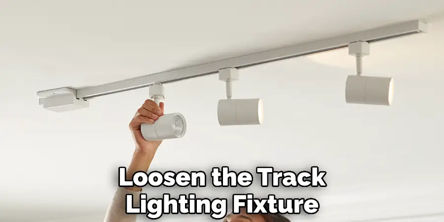 Loosen the Track Lighting Fixture