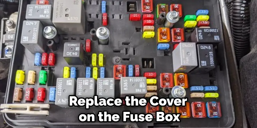 Replace the Cover on the Fuse Box