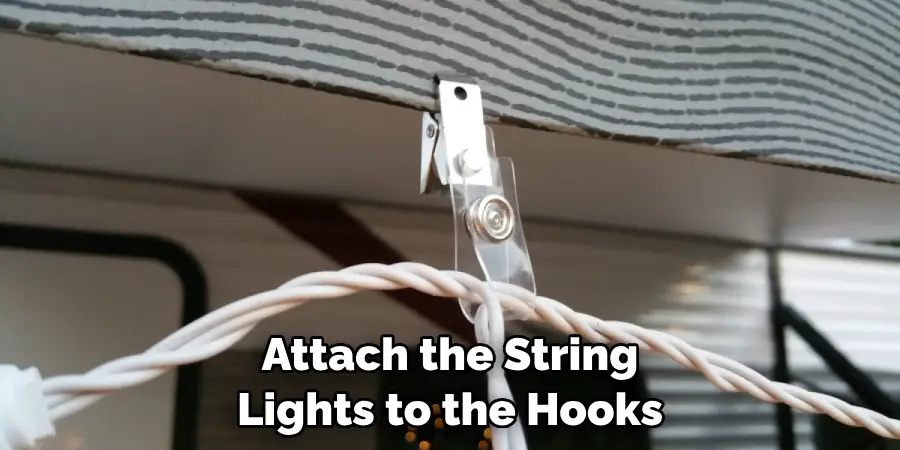 Attach the String Lights to the Hooks