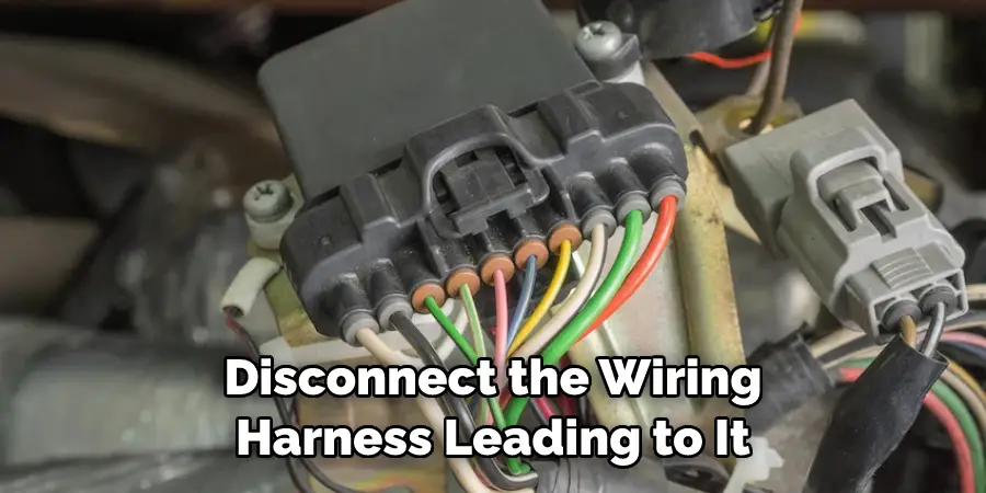 Disconnect the Wiring Harness Leading to It